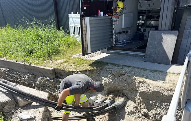 Menner Tiefbau Kabelmontage 
